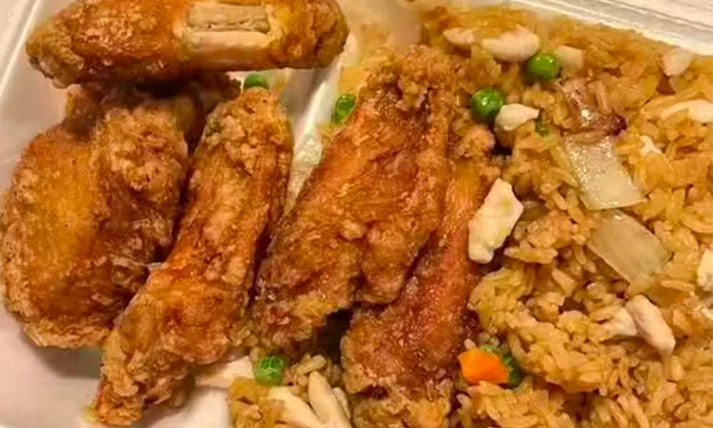 Crispy fried chicken wings paired with flavorful fried rice at Nihao, a Chinese Restaurant in Lexington